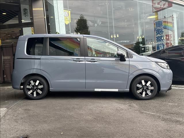 フリード e:HEVエアー EX 登録済未使用車 バックカメラ ブレーキサポート レーンサポート ソナー クルーズコントロール シートヒーター 両側電動スライドドア スマートキー アイドリングストップ オートエアコン 電動格納ミラー(7枚目)