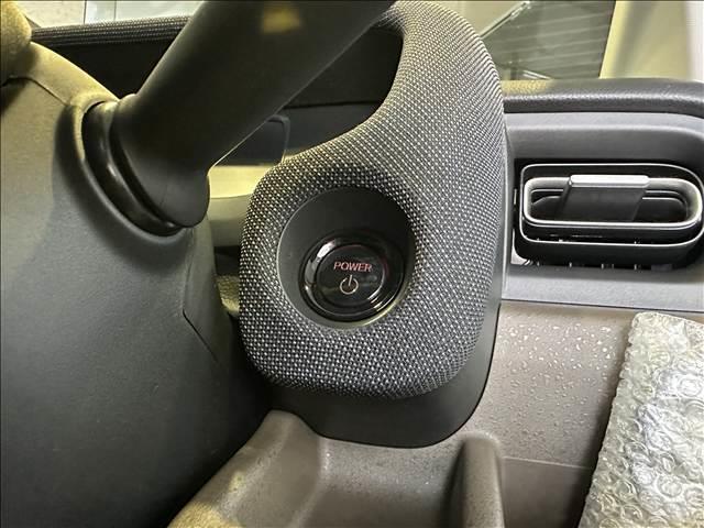 フリード ｅ：ＨＥＶエアー　ＥＸ　登録済未使用車　バックカメラ　ブレーキサポート　レーンサポート　ソナー　クルーズコントロール　シートヒーター　両側電動スライドドア　スマートキー　アイドリングストップ　オートエアコン　電動格納ミラー（13枚目）