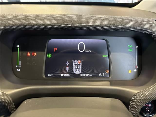 フリード ｅ：ＨＥＶエアー　ＥＸ　登録済未使用車　バックカメラ　ブレーキサポート　レーンサポート　ソナー　クルーズコントロール　シートヒーター　両側電動スライドドア　スマートキー　アイドリングストップ　オートエアコン　電動格納ミラー（15枚目）