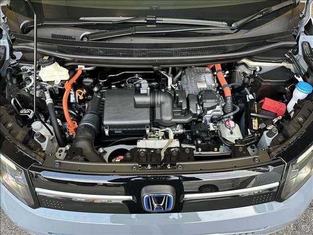 フリード ｅ：ＨＥＶエアー　ＥＸ　登録済未使用車　バックカメラ　ブレーキサポート　レーンサポート　ソナー　クルーズコントロール　シートヒーター　両側電動スライドドア　スマートキー　アイドリングストップ　オートエアコン　電動格納ミラー（20枚目）