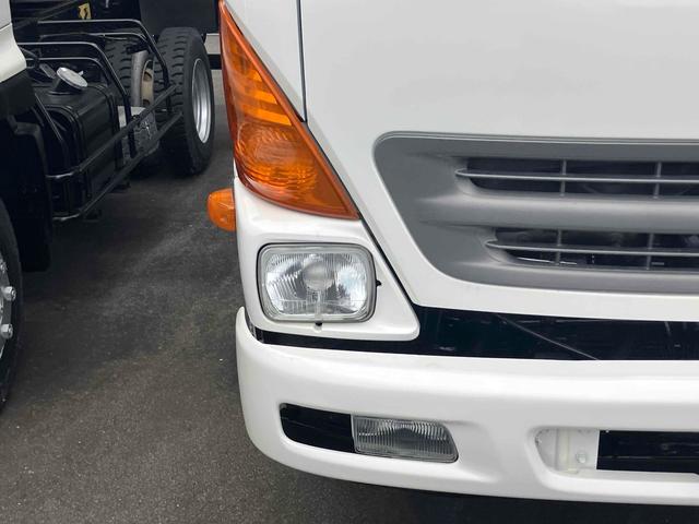 ヒノレンジャー 　４．０ｔダンプ　電動コボレーン付　６ＭＴ　後輪ダブル　キーレスエントリー　電動格納ミラー　アルミホイール　エアコン　パワーウィンドウ　運転席エアバッグ（4枚目）