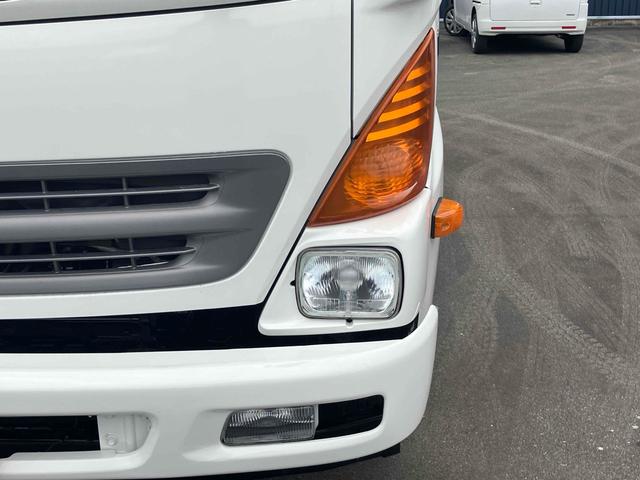 ヒノレンジャー 　４．０ｔダンプ　電動コボレーン付　６ＭＴ　後輪ダブル　キーレスエントリー　電動格納ミラー　アルミホイール　エアコン　パワーウィンドウ　運転席エアバッグ（5枚目）