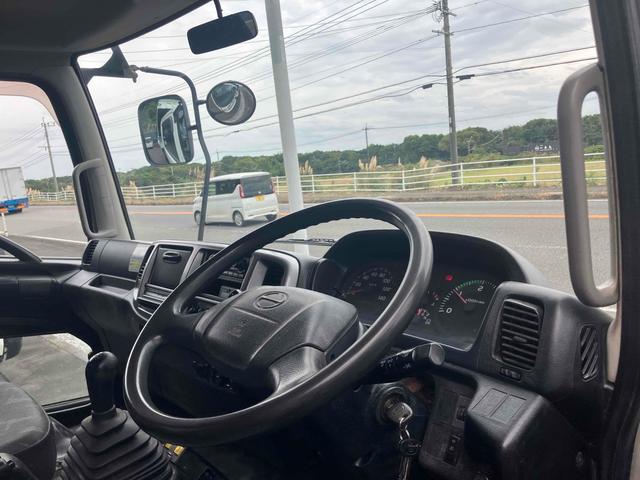 ヒノレンジャー 　４．０ｔダンプ　電動コボレーン付　６ＭＴ　後輪ダブル　キーレスエントリー　電動格納ミラー　アルミホイール　エアコン　パワーウィンドウ　運転席エアバッグ（51枚目）