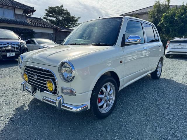 ミラジーノ ミニライトスペシャルターボ HID キーレスエントリー 電動格納ミラー MT ABS CD アルミホイール 衝突安全ボディ エアコン パワーステアリング(3枚目)