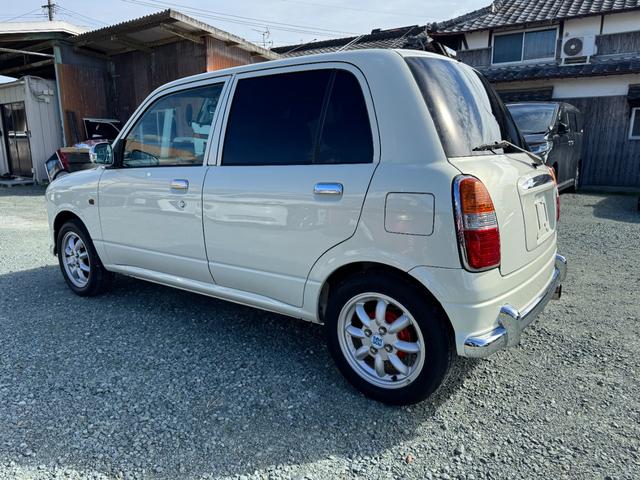 ミラジーノ ミニライトスペシャルターボ HID キーレスエントリー 電動格納ミラー MT ABS CD アルミホイール 衝突安全ボディ エアコン パワーステアリング(4枚目)