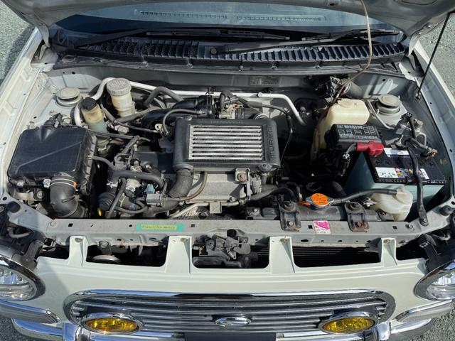 ミラジーノ ミニライトスペシャルターボ HID キーレスエントリー 電動格納ミラー MT ABS CD アルミホイール 衝突安全ボディ エアコン パワーステアリング(11枚目)