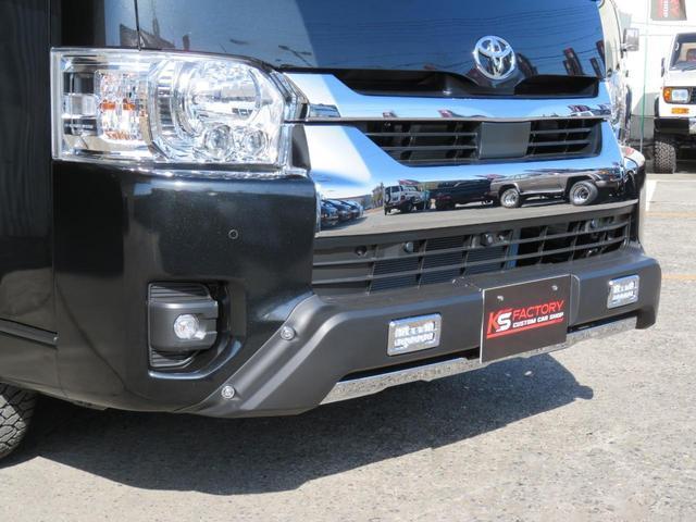 ハイエースワゴン ＧＬ　新車未登録／２７００ｃｃ／ＬＥＤヘッド／ＤＩＭ／ＰＶＭ／バンパーガード／コブラＬＥＤテール／ブラックシートカバー／オリジナルホイール／オープンカントリーＭＴ／ナビ／フリップ／オーバーフェンダー（22枚目）