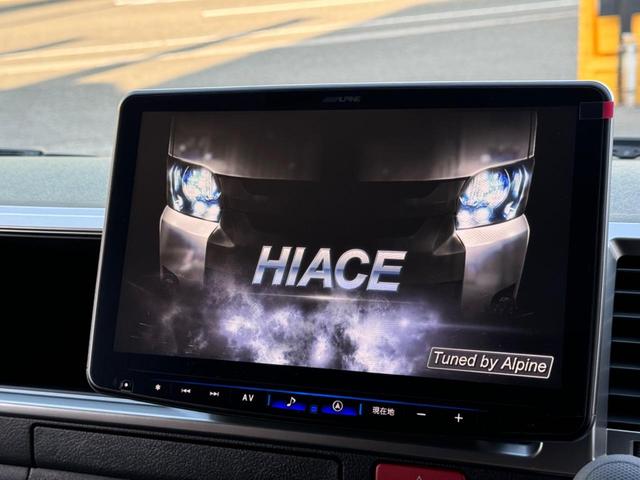 ハイエースワゴン ＧＬ　ワンオーナー／丸目フェイス／ＡＬＰＩＮＥ１１インチＢＩＧＸナビ／１２，８インチ後席モニター／天井スピーカ－／前後ドライブレコーダー／フルフラットベッド／ブラウン内装／キャンピングカー仕様／車中泊仕様（15枚目）