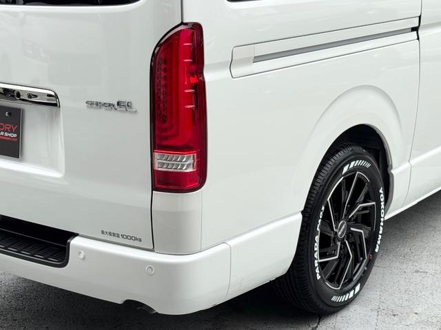 ハイエースバン スーパーＧＬ　ダークプライムＩＩ　未登録新車／コンプリートカー／バッドフェイス／４１５コブラ／フロントスポイラー／ＥＳＳＥＸ／ＥＷ－１７／ヨコハマパラダ／ローダウン／ヴァレンティ／ＬＥＤテールランプ／ハイエースカスタム／パノラミック（27枚目）