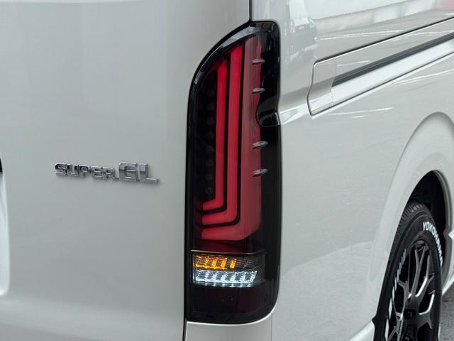 ハイエースバン スーパーＧＬ　ダークプライムＩＩ　未登録新車／コンプリートカー／バッドフェイス／４１５コブラ／フロントスポイラー／ＥＳＳＥＸ／ＥＷ－１７／ヨコハマパラダ／ローダウン／ヴァレンティ／ＬＥＤテールランプ／ハイエースカスタム／パノラミック（70枚目）