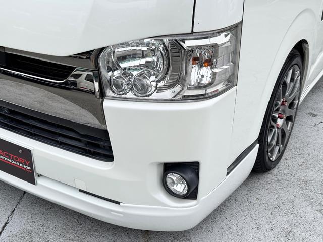 ハイエースバン スーパーＧＬ　ダークプライム　ディーゼル車／フルエアロ／ＥＳＳＥＸ／１８ＡＷ／／ローダウン／ＣＲＳバッドフェイスボンネット／８インチナビ／ＥＴＣ／バックカメラ／４１５コブラ／フロントスポイラー／ハイエース／カスタム／中古ハイエース（26枚目）