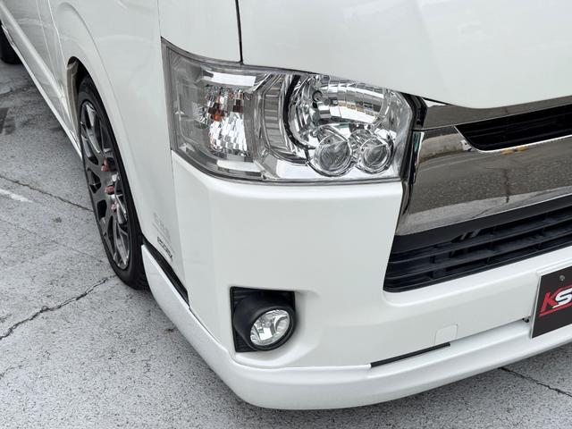 ハイエースバン スーパーＧＬ　ダークプライム　ディーゼル車／フルエアロ／ＥＳＳＥＸ／１８ＡＷ／／ローダウン／ＣＲＳバッドフェイスボンネット／８インチナビ／ＥＴＣ／バックカメラ／４１５コブラ／フロントスポイラー／ハイエース／カスタム／中古ハイエース（27枚目）