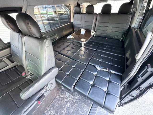 ハイエースワゴン ＧＬ　新車／ベッドキット／テーブル／シートアレンジ／フルフラット／新品１７ＡＷ／ゼロブレイク／４１５コブラスポイラー／ローダウン／ナスカータイヤ／間接照明／フローリング施工／新車ハイエースカスタム（5枚目）