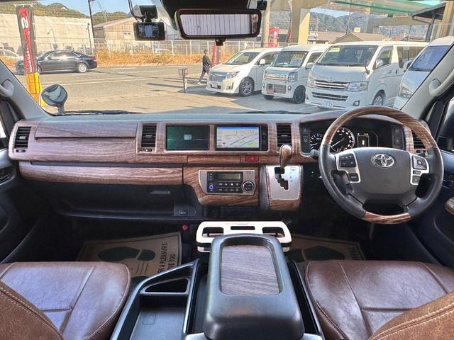 ハイエースワゴン GL ワンオーナー/ベッド/テーブル/床張り/特設ライトイエロー/バンパーガード/DEENコロラド/16AW/TOYOオープンカントリーRT/フリップダウンモニター/全方位カメラ/中古ハイエースカスタム(2枚目)