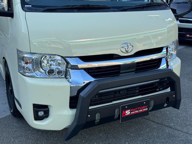 ハイエースワゴン GL ワンオーナー/ベッド/テーブル/床張り/特設ライトイエロー/バンパーガード/DEENコロラド/16AW/TOYOオープンカントリーRT/フリップダウンモニター/全方位カメラ/中古ハイエースカスタム(56枚目)