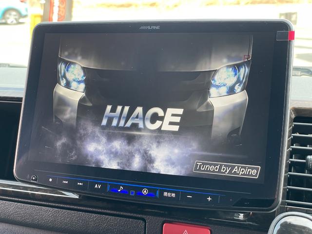 ハイエースバン スーパーＧＬ　ダークプライムＩＩ　ディーゼル車／ＡＬＰＩＮＥ１１インチＢＩＧＸナビ／ローダウン／４１５ＣＯＢＲＡフロントリップ／ＥＳＳＥＸ　ＥＣ－１７ＡＷ／ベッドキット／ＥＴＣ／バックカメラ／ＬＥＤヘッドランプ／両側パワースライドドア（2枚目）
