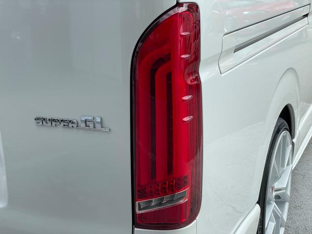 ハイエースバン スーパーＧＬ　ダークプライムＩＩ　ディーゼル車／ＷＡＬＤフルエアロ／両側パワースライド／小窓付ガラス／ゼロブレイク２０ＡＷ／ローダウン／リアウイング／ケンウッドナビ／ＥＴＣ／ドライブレコーダー／レーダー／バッドフェイスボンネットカバー（37枚目）