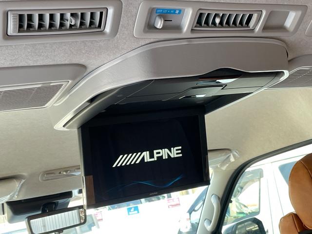 ハイエースワゴン ＧＬ　未登録新車／ＡＬＰＩＮＥ１１インチＢＩＧＸナビ／ＫＳＦブラックエディション／１２．８インチフリップダウンモニター／ＪＡＯＳスキッドバー／ＴＲＤマッドフラップ／キャメルシートカバー／ハイエースカスタム（3枚目）