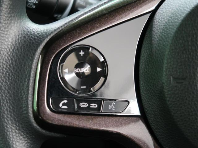 G・Lホンダセンシング ホンダセンシング 純正ナビ フルセグTV LEDヘッド 純正14インチAW 電動スライド ドライブレコーダー バックカメラ ビルトインETC オートライト レーダークルーズ スマートキー 禁煙車(36枚目)