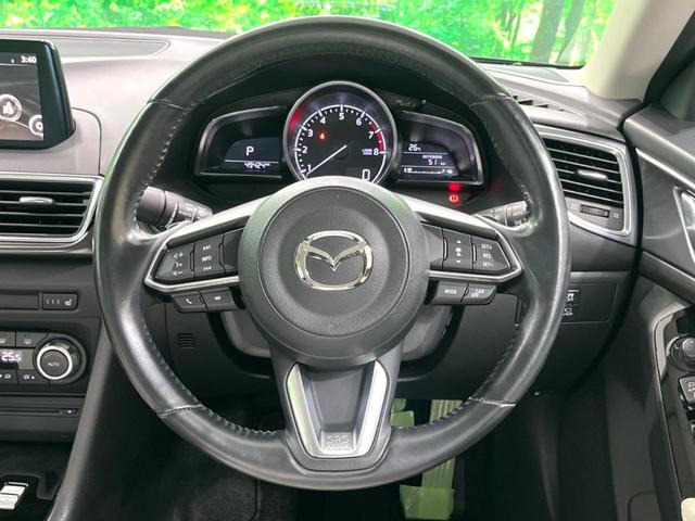 アクセラ １５Ｓ　Ｌパッケージ　純正ナビ　白革シート　全周囲カメラ　フルセグ　シートヒーター　パワーシート　シートメモリー　ＢＳＭ　ドラレコ　ＬＥＤヘッド　レーダークルーズ　衝突軽減　オートエアコン　スマートキー（12枚目）