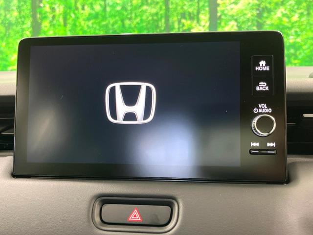 ヴェゼル ｅ：ＨＥＶ　Ｚ　登録済未使用車　純正９インチナビ　ＥＴＣ　ＬＥＤヘッド　レーダークルーズ　置くだけ充電　パワーバックドア　ホンダセンシング　電子パーキング　オートホールド（3枚目）