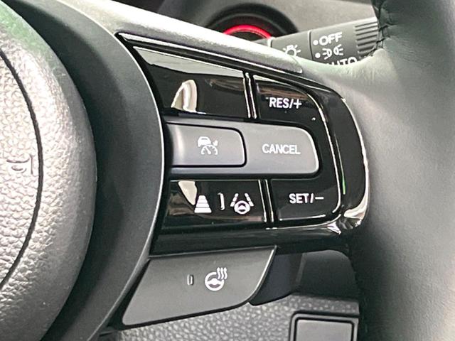 ヴェゼル ｅ：ＨＥＶ　Ｚ　登録済未使用車　純正９インチナビ　ＥＴＣ　ＬＥＤヘッド　レーダークルーズ　置くだけ充電　パワーバックドア　ホンダセンシング　電子パーキング　オートホールド（7枚目）