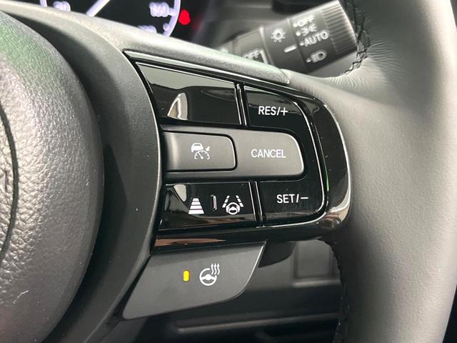 ヴェゼル ｅ：ＨＥＶ　Ｚ　登録済未使用車　純正９インチナビ　全周囲カメラ　フルセグ　パワーバックドア　ＥＴＣ　ブラインドスポットモニター　衝突軽減　レーダークルーズ　前席シートヒーター　ステアリングヒーター　ＬＥＤヘッド（7枚目）