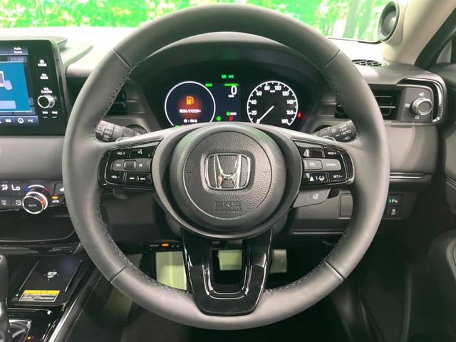 ヴェゼル ｅ：ＨＥＶ　Ｚ　登録済未使用車　純正９インチナビ　全周囲カメラ　フルセグ　パワーバックドア　ＥＴＣ　ブラインドスポットモニター　衝突軽減　レーダークルーズ　前席シートヒーター　ステアリングヒーター　ＬＥＤヘッド（12枚目）