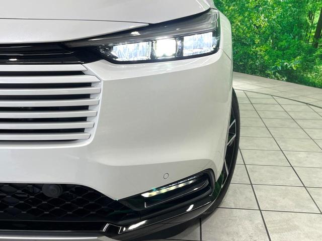 ヴェゼル ｅ：ＨＥＶ　Ｚ　登録済未使用車　純正９インチナビ　全周囲カメラ　フルセグ　パワーバックドア　ＥＴＣ　ブラインドスポットモニター　衝突軽減　レーダークルーズ　前席シートヒーター　ステアリングヒーター　ＬＥＤヘッド（13枚目）