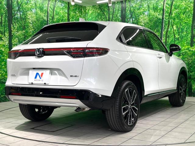 ヴェゼル ｅ：ＨＥＶ　Ｚ　登録済未使用車　純正９インチナビ　全周囲カメラ　フルセグ　パワーバックドア　ＥＴＣ　ブラインドスポットモニター　衝突軽減　レーダークルーズ　前席シートヒーター　ステアリングヒーター　ＬＥＤヘッド（18枚目）