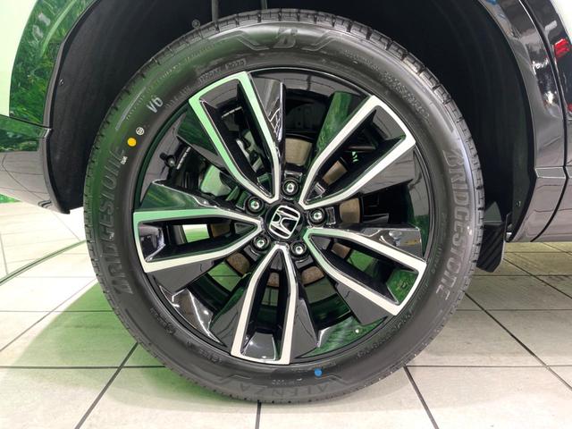 ヴェゼル ｅ：ＨＥＶ　Ｚ　登録済未使用車　純正９インチナビ　全周囲カメラ　フルセグ　パワーバックドア　ＥＴＣ　ブラインドスポットモニター　衝突軽減　レーダークルーズ　前席シートヒーター　ステアリングヒーター　ＬＥＤヘッド（63枚目）