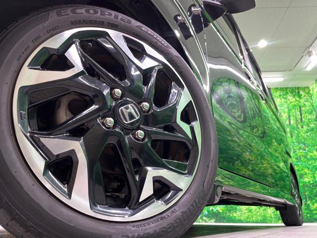 N-BOXカスタム G・Lターボホンダセンシング 純正8インチナビ 両側電動 バックカメラ ワンオーナー シートヒーター ETC 衝突軽減 レーダークルーズ LEDヘッド フルセグ Bluetooth ハーフレザーシート(13枚目)