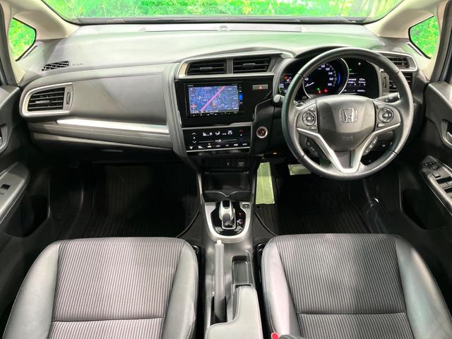 フィットハイブリッド L ホンダセンシング 純正ナビ バックカメラ ETC 衝突軽減 LEDヘッド フルセグ Bluetooth レーダークルーズ オートエアコン スマートキー(2枚目)