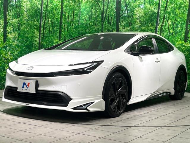 プリウス Ｘ　モデリスタエアロ　モデリスタ１９インチアルミホイール　純正８インチＤＡ　バックカメラ　ＢＳＭ　クリアランスソナー　衝突軽減　レーダークルーズ　ＡＣ１００Ｖ　ＥＴＣ２．０　ドラレコ　スマートキー（22枚目）