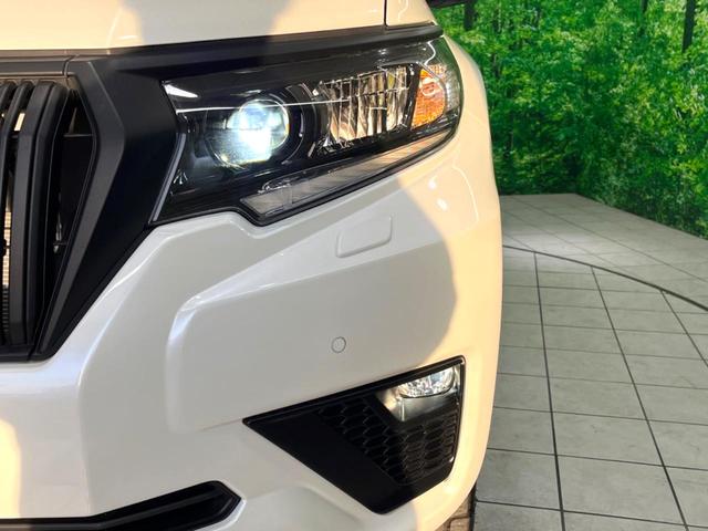 ランドクルーザープラド TX Lパッケージ マットブラックエディション ディーゼル サンルーフ メーカー9インチナビ 全周囲カメラ 7人 ベージュ革シート BSM ブラックルーフレール シートベンチレーション パワーシート レーダークルーズ ETC スマートキー(13枚目)