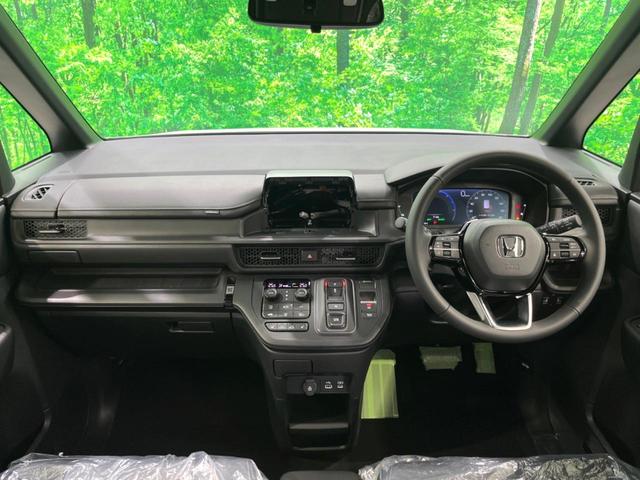 ステップワゴン ｅ：ＨＥＶスパーダ　登録済未使用車　両側電動ドア　ＢＳＭ　衝突軽減　電動リアゲート　シートヒーター　ハーフレザーシート　コーナーセンサー　スマートキー　ＬＥＤヘッド　純正１６インチアルミ　車線逸脱警報　オートライト（2枚目）