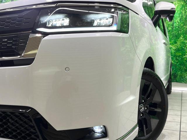 ステップワゴン ｅ：ＨＥＶスパーダ　登録済未使用車　両側電動ドア　ＢＳＭ　衝突軽減　電動リアゲート　シートヒーター　ハーフレザーシート　コーナーセンサー　スマートキー　ＬＥＤヘッド　純正１６インチアルミ　車線逸脱警報　オートライト（13枚目）