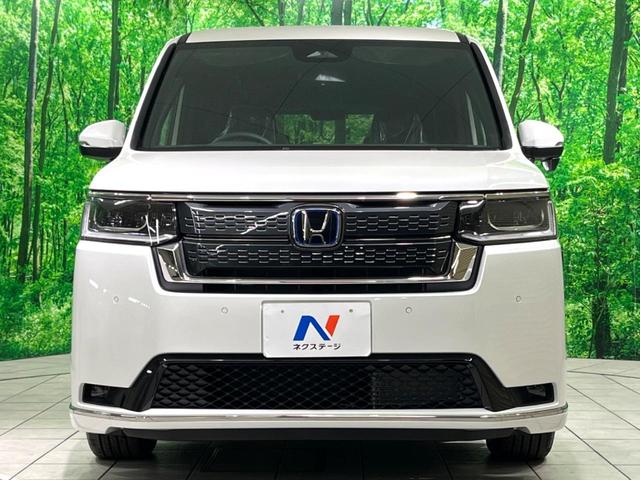 ステップワゴン ｅ：ＨＥＶスパーダ　登録済未使用車　両側電動ドア　ＢＳＭ　衝突軽減　電動リアゲート　シートヒーター　ハーフレザーシート　コーナーセンサー　スマートキー　ＬＥＤヘッド　純正１６インチアルミ　車線逸脱警報　オートライト（15枚目）