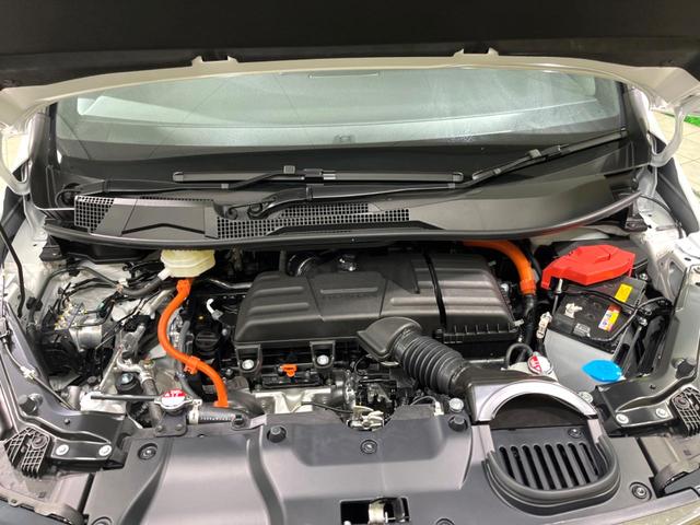 ステップワゴン ｅ：ＨＥＶスパーダ　登録済未使用車　両側電動ドア　ＢＳＭ　衝突軽減　電動リアゲート　シートヒーター　ハーフレザーシート　コーナーセンサー　スマートキー　ＬＥＤヘッド　純正１６インチアルミ　車線逸脱警報　オートライト（19枚目）