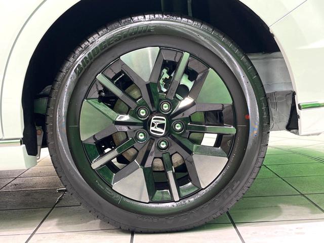 ステップワゴン ｅ：ＨＥＶスパーダ　登録済未使用車　両側電動ドア　ＢＳＭ　衝突軽減　電動リアゲート　シートヒーター　ハーフレザーシート　コーナーセンサー　スマートキー　ＬＥＤヘッド　純正１６インチアルミ　車線逸脱警報　オートライト（64枚目）