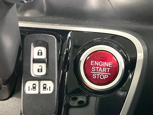 Ｎ－ＢＯＸカスタム Ｇ　ＳＳパッケージ　ナビ　両側電動スライド　ＥＴＣ　ＨＩＤヘッド　スマートキー　オートエアコン　純正１４インチアルミホイール　ステアリングリモコン　電動格納ミラー（6枚目）