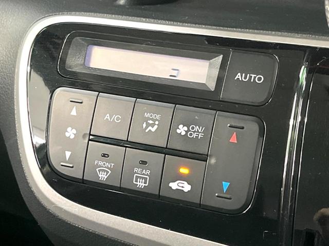 Ｎ－ＢＯＸカスタム Ｇ　ＳＳパッケージ　ナビ　両側電動スライド　ＥＴＣ　ＨＩＤヘッド　スマートキー　オートエアコン　純正１４インチアルミホイール　ステアリングリモコン　電動格納ミラー（7枚目）