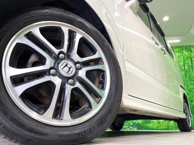 Ｎ－ＢＯＸカスタム Ｇ　ＳＳパッケージ　ナビ　両側電動スライド　ＥＴＣ　ＨＩＤヘッド　スマートキー　オートエアコン　純正１４インチアルミホイール　ステアリングリモコン　電動格納ミラー（14枚目）