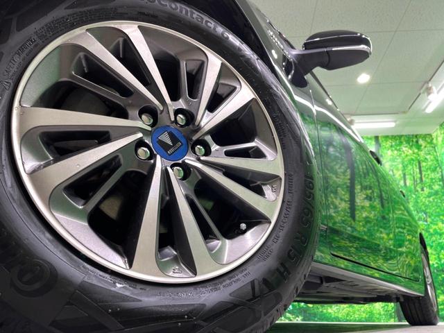 プリウス Ａプレミアム　ＢＩＧ－Ｘ９型ナビ　バックカメラ　衝突軽減装置　レーダークルーズ　禁煙車　レザーシート　パワーシート　ドラレコ　コーナーセンサー　スマートキー　ＬＥＤヘッド　ビルトインＥＴＣ　純正１５インチアルミ（13枚目）