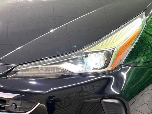 プリウス Ｓ　禁煙車　純正９型ナビ　バックカメラ　衝突軽減装置　レーダークルーズ　レザー調シート　パワーシート　ドラレコ　ＥＴＣ　シートヒーター　コーナーセンサー　スマートキー　ＬＥＤヘッド　オートハイビーム（12枚目）