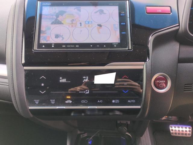 フィットハイブリッド Ｌパッケージ　ハイブリッド　ＥＴＣ　ＴＶ　オートクルーズコントロール　ＬＥＤヘッドランプ　スマートキー　電動格納ミラー　ＡＴ　盗難防止システム　衝突安全ボディ　ＡＢＳ　ＥＳＣ　エアコン　パワーステアリング（4枚目）