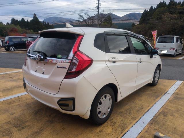 フィットハイブリッド Ｌパッケージ　ハイブリッド　ＥＴＣ　ＴＶ　オートクルーズコントロール　ＬＥＤヘッドランプ　スマートキー　電動格納ミラー　ＡＴ　盗難防止システム　衝突安全ボディ　ＡＢＳ　ＥＳＣ　エアコン　パワーステアリング（15枚目）