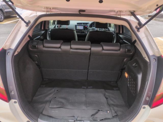 フィットハイブリッド Ｌパッケージ　ハイブリッド　ＥＴＣ　ＴＶ　オートクルーズコントロール　ＬＥＤヘッドランプ　スマートキー　電動格納ミラー　ＡＴ　盗難防止システム　衝突安全ボディ　ＡＢＳ　ＥＳＣ　エアコン　パワーステアリング（19枚目）