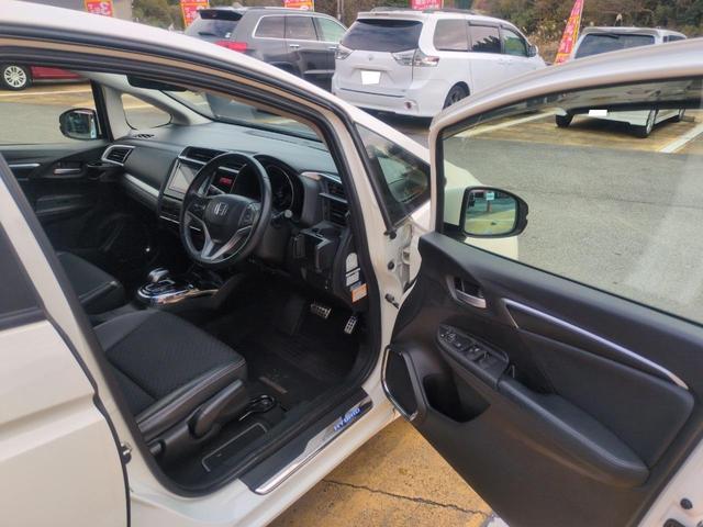 フィットハイブリッド Ｌパッケージ　ハイブリッド　ＥＴＣ　ＴＶ　オートクルーズコントロール　ＬＥＤヘッドランプ　スマートキー　電動格納ミラー　ＡＴ　盗難防止システム　衝突安全ボディ　ＡＢＳ　ＥＳＣ　エアコン　パワーステアリング（24枚目）