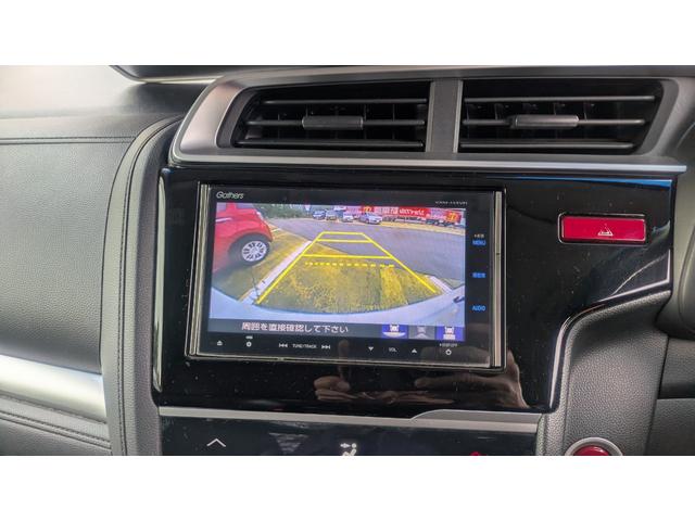 フィットハイブリッド Ｌパッケージ　ハイブリッド　ＥＴＣ　ＴＶ　オートクルーズコントロール　ＬＥＤヘッドランプ　スマートキー　電動格納ミラー　ＡＴ　盗難防止システム　衝突安全ボディ　ＡＢＳ　ＥＳＣ　エアコン　パワーステアリング（55枚目）